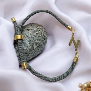 Elegant Gold and Green Bracelet